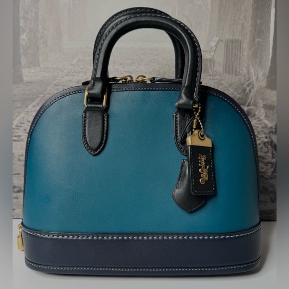 Coach Handbags - EUC Coach Revel Bag in Colorblock Glovetanned Leather Dark Turqouise CC412